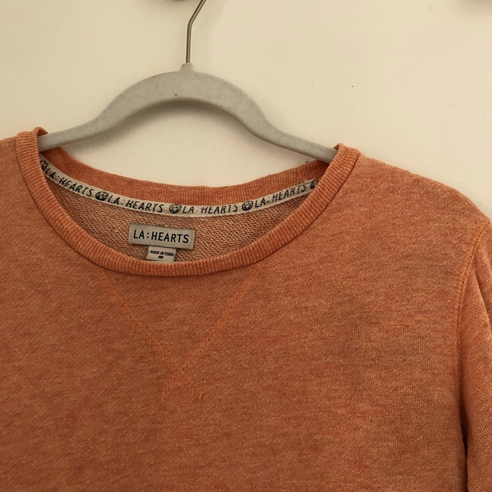 Orange sweater with front pockets